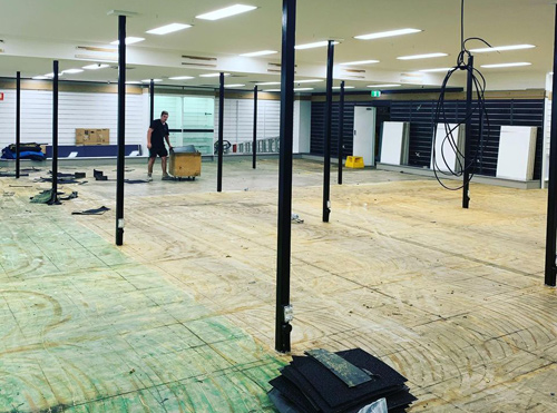 Floor stripping in progress